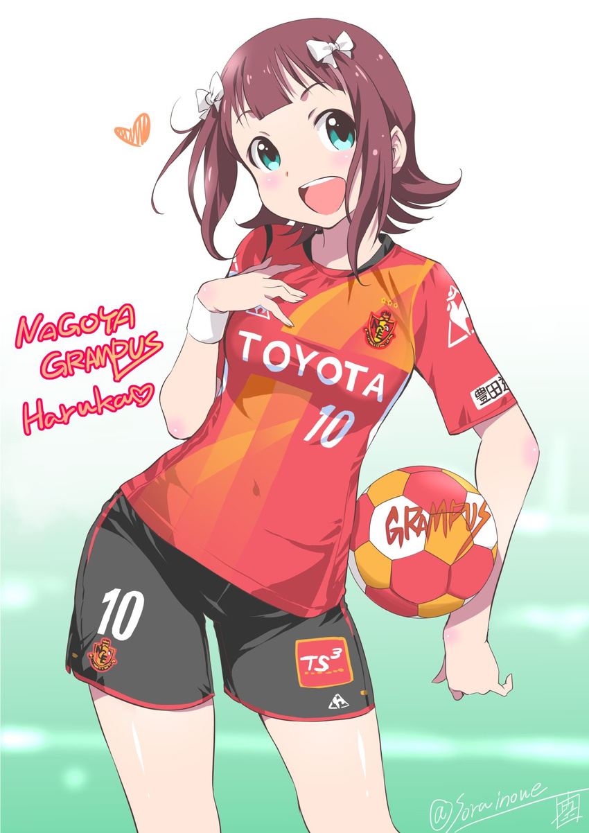 :d amami_haruka ball blush brown_hair commentary_request female green_eyes hair_ribbon heart highres idolmaster idolmaster_(classic) inoue_sora j._league looking_at_viewer nagoya_grampus open_mouth ribbon short_hair short_sleeves shorts signature smile soccer soccer_ball soccer_uniform solo sportswear toyota twitter_username wristband