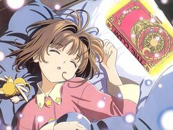  :o antenna_hair book brown_hair cardcaptor_sakura closed_eyes crescent female from_above futon glowing hair_intakes head_tilt highres indoors jpeg_artifacts kero_(cardcaptor_sakura) kinomoto_sakura light_particles lolicon long_sleeves lying messy_hair official_art on_back pajamas pillow pink_shirt scan shirt short_hair sleeping solo_focus star_(symbol) star_print sun_symbol suzuki_norimitsu under_covers upper_body 