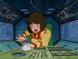  1980s_(style) animated animated black_eyes bob_cut brown_hair buttons cable chair choujikuu_yousai_macross cockpit female lowres macross mecha military military_uniform panapp retro_artstyle robot scared science_fiction screen sdf-1 spacecraft spacecraft_interior trackball traditional_media u.n._spacy uniform worried 