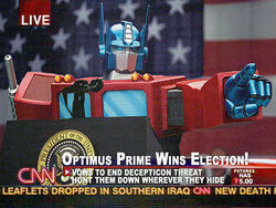  american_flag anime_screenshot autobot breaking_news cnn english_text iraq_war lowres mecha mecha_focus microphone no_humans optimus_prime podium pointing robot robot_chicken solo transformers transformers:_generation_1 united_states 