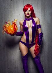  cosplay dc_comics female photo red_hair solo standing starfire starfire_(cosplay) thighhighs vambraces 