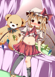  bed black_thighhighs blonde_hair blush bow canopy_bed clothes_lift commentary_request female flandre_scarlet hat hat_bow kazura looking_at_viewer midriff mob_cap mouth_hold navel on_bed pillow puffy_sleeves red_eyes shirt_lift short_sleeves side_ponytail sitting skirt skirt_set slippers solo stuffed_animal stuffed_toy teddy_bear thighhighs thighhighs_pull touhou wings 