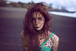  animal_humanoid blue_eyes brown_hair felid felid_humanoid female hair hi_res humanoid jaguar_humanoid leopard looking_at_viewer mammal mammal_humanoid odysseusut pantherine pantherine_humanoid photo_manipulation photomorph solo third-party_edit 