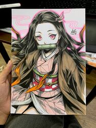  artist&#039;s_hand_in_frame bamboo bit_gag black_hair checkered_sash commentary english_commentary female forehead gag gagged hair_ribbon highres japanese_clothes kamado_nezuko kimetsu_no_yaiba kimono long_hair looking_at_viewer marker_(medium) mouth_hold multicolored_hair obi photo_(medium) pink_eyes pink_ribbon ribbon sash solo stanley_lau traditional_media very_long_hair 