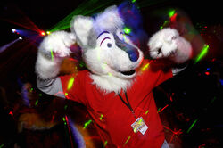 absurd_res anthro blue_eyes canid canine canis char_(photographer) clothing costume dancing domestic_dog duo fursuit hi_res laser male mammal rave real solo_focus wolf