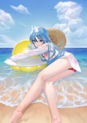  ahoge barefoot beach bikini bikini_under_clothes blue_eyes blue_hair blue_sky breasts closed_mouth cloud cloudy_sky commentary day denpa_onna_to_seishun_otoko eyelashes female foot_out_of_frame hat inflatable_toy knees_together_feet_apart legs long_hair long_legs long_sleeves looking_at_viewer lying mi8pq on_side outdoors red_bikini see-through shirt sidelocks sky smile soles solo sun_hat swimsuit touwa_erio unworn_hat unworn_headwear water wet wet_clothes wet_shirt white_shirt 