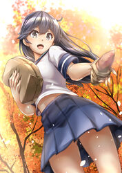  ahoge autumn_leaves bag black_hair blue_sailor_collar blue_skirt brown_eyes commentary_request cowboy_shot female food from_below fukami_naoyuki kantai_collection long_hair midriff_peek navel paper_bag pleated_skirt sailor_collar school_uniform serafuku skirt smile solo standing sweet_potato tree ushio_(kancolle) 