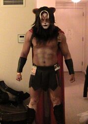 anthro clothing costume felid fursuit gladiator grandfathered_content kiwa lion male mammal pantherine photography_(artwork) real solo spartan_(roman) unknown_artist warrior