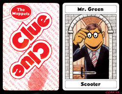  2023 4_fingers adjusting_glasses black_border black_clothing black_jacket black_suit black_topwear border brown_hair bruce_mccorkindale card clothing clue_(film) cluedo crossover dagger english_text eyewear fingerprint fingers glasses hair hasbro humanoid jacket looking_down magnifying_glass male mansion melee_weapon mr._green muppet muppets necktie noseless orange_body orange_skin parody pattern_necktie playing_card scooter_(muppets) shirt signature solo striped_necktie suit tabletop_game text the_muppet_show topwear weapon white_clothing white_shirt white_topwear window 