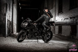  alley batman_(series) boots catwoman catwoman_(cosplay) cosplay dc_comics female high_heels highres honda honda_cbr600rr_(pc40) motor_vehicle motorcycle night photo solo vehicle yaya_han 