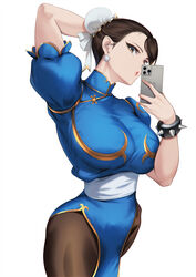  :o arm_behind_head blue_dress blueorca bracelet breasts brown_eyes brown_hair bun_cover cellphone china_dress chinese_clothes chun-li dress earrings female gold_trim hair_bun highres holding holding_phone jewelry large_breasts looking_at_viewer pantyhose pelvic_curtain phone sash selfie short_hair simple_background smartphone solo spiked_bracelet spikes street_fighter thighs white_background 