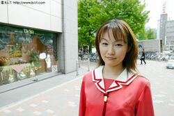  azumanga_daioh&#039;s_school_uniform azumanga_daiou bicycle blt blurry brown_eyes brown_hair building city closed_mouth collarbone cosplay cosplay_photo day depth_of_field female hayakawa_saki long_hair looking_at_viewer outdoors photo_(medium) pink_serafuku pink_shirt road_sign sakaki_(azumanga_daioh) school_uniform serafuku shirt sign sky smile solo_focus storefront tree winter_uniform 