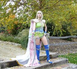  celes_chere celes_chere_(cosplay) cosplay female final_fantasy final_fantasy_vi long_hair photo solo sword weapon 