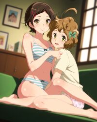  2girls ahoge blurry blurry_background blush bow bow_bra bow_panties bra breasts brown_hair hair_ornament hair_ribbon hairclip hibike!_euphonium highres katou_hazuki kawashima_sapphire medium_hair multiple_girls navel open_mouth panties pink_panties print_panties ribbon sbel02 shirt sitting small_breasts smile striped_clothes striped_panties underwear wariza yellow_eyes yellow_shirt yuri 