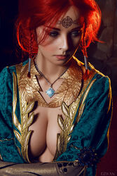  blue_eyes breasts circlet cleavage cosplay costume dress female freckles helly_von_valentine_(disharmonica) indoors jewelry large_breasts long_hair necklace no_bra pendant photo red_hair robe side_braids solo the_witcher triss_merigold 