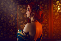  back circlet cosplay costume dress female freckles helly_von_valentine_(disharmonica) indoors jewelry looking_afar makeup necklace no_bra off_shoulder parted_lips photo red_hair robe side_braids solo the_witcher triss_merigold undressing upper_body 