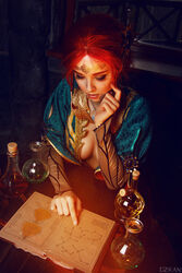  book breasts circlet cosplay costume dress female flask freckles from_above helly_von_valentine_(disharmonica) indoors jewelry makeup medium_breasts necklace no_bra parted_lips pendant photo red_hair robe side_braids sitting solo table the_witcher triss_merigold upper_body 