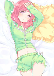  bad_id bad_pixiv_id blush female frilled_pillow frills highres love_live! love_live!_school_idol_project midriff navel nerunnn nishikino_maki pajamas pillow pink_hair purple_eyes short_hair solo stomach 