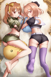  2girls ahoge ass bare_legs barefoot bernie_(brown_dust) between_legs black_jacket black_ribbon black_shorts blush brown_dust_2 brown_eyes brown_gloves brown_hair controller cropped_jacket eyebrows_hidden_by_hair feet foot_out_of_frame game_controller gloves green_jacket green_shorts hair_between_eyes hair_ribbon highres holding holding_controller holding_game_controller jacket kneepits legs lying multiple_girls no_shoes on_side on_stomach open_mouth partially_fingerless_gloves pillow purple_thighhighs red_eyes ribbon rigenette_(brown_dust) rug scopedog_12 short_shorts shorts smile soles thighhighs toes tongue tongue_out yellow_ribbon 