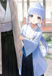  1boy aged_down arm_at_side black_hakama blue_coat blue_eyes blue_hair blunt_bangs blurry blush clothes_grab coat day depth_of_field ebiri_fy female garden genshin_impact hair_ornament hair_ribbon hair_tubes hakama haori high_ponytail highres japanese_clothes kamisato_ayaka lolicon long_hair long_sleeves looking_at_viewer out_of_frame outdoors parted_lips ponytail railing ribbon sidelocks solo_focus standing tress_ribbon very_long_hair wide_sleeves 