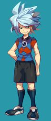  1boy blue_hair chaos_(inazuma_eleven) green_eyes grin highres inazuma_eleven inazuma_eleven_(series) male_focus motojima_hakka sleeves_rolled_up smile soccer_uniform solo sportswear standing suzuno_fuusuke 