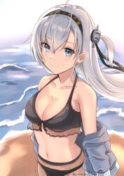  absurdres beach bikini bikini_skirt black_bikini black_headband blush breasts clothes_writing collarbone cowboy_shot day female grey_eyes grey_hair grey_jacket hachimaki hair_between_eyes headband highres jacket kantai_collection long_hair looking_at_viewer medium_breasts ocean one_side_up outdoors sand see-through see-through_skirt skirt smile solo sukimizaki suzutsuki_(swimsuit_mode)_(kancolle) swimsuit swimsuit_under_clothes 