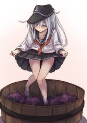  anchor_symbol bare_legs barefoot black_hat black_sailor_collar black_skirt blue_eyes blush female flat_cap food fruit grape_stomping grapes grey_hair hair_between_eyes hat hibiki_(kancolle) highres kantai_collection kuuru_(kuuru-n) long_hair long_sleeves neckerchief parted_lips pleated_skirt red_neckerchief sailor_collar school_uniform serafuku skirt solo 