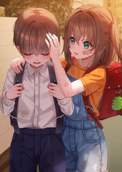  1boy backpack bag bag_charm bandaid bandaid_on_face black_pants blue_pants brown_hair charm_(object) commentary_request crying denim dirty dirty_clothes female green_eyes highres lolicon long_hair original outdoors overalls pants photoshop_(medium) randoseru school_uniform shirt sunset tears unjem white_shirt 