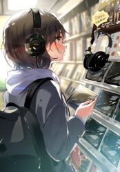  backpack bag blazer bob_cut brown_hair cd_case commentary female headphones highres hood hoodie jacket original profile shop short_hair solo standing tears translation_request upper_body yukimaru_nun 