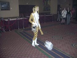 4:3 brittany_diggers cheetah clothed clothing cosplay costume felid feline female fursuit gold_digger grandfathered_content group human mammal real solo_focus unknown_artist