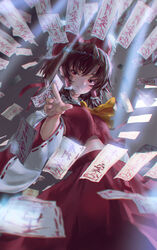  absurdres arm_up ascot between_fingers black_hair blurry blurry_background blurry_foreground bow breasts closed_mouth commentary_request cowboy_shot detached_sleeves dutch_angle female floating_hair frilled_bow frills hair_between_eyes hair_tubes hairbow hakurei_reimu half-closed_eyes head_tilt highres holding light_particles light_rays looking_at_viewer midriff ofuda ofuda_between_fingers outstretched_hand partial_commentary red_bow red_eyes red_ribbon red_skirt red_vest ribbon ribbon-trimmed_sleeves ribbon_trim shirt short_hair shuru_y skirt skirt_set small_breasts smile solo spell_card standing sunbeam sunlight taut_clothes taut_shirt touhou vest wide_sleeves yellow_ascot 