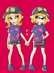  2girls bad_id bad_twitter_id baseball_cap clothes_writing comamawa commentary_request hand_on_own_hip hat highres holding_hands inkling inkling_girl inkling_player_character looking_at_another matching_outfits multiple_girls octoling octoling_girl octoling_player_character orange_eyes orange_hair pink_background pointy_ears short_hair short_shorts shorts shorts_under_skirt smile splatoon_(series) splatoon_2 standing tentacle_hair 