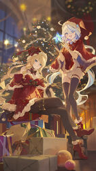  2girls absurdres ahoge alternate_costume aqua_eyes black_pantyhose black_thighhighs blonde_hair blue_eyes blue_hair blurry blurry_background blush boots box box_stack breasts christmas christmas_ornaments christmas_tree commentary crossed_legs detached_collar detached_sleeves dress feet_out_of_frame french_commentary full_body fur-trimmed_dress fur-trimmed_headwear fur-trimmed_sleeves fur_trim furina_(genshin_impact) genshin_impact gift gift_box gloves hat highres light_blue_hair long_hair looking_at_viewer mixed-language_commentary modare multicolored_hair multiple_girls navia_(genshin_impact) open_mouth panties pantyhose pom_pom_(clothes) red_dress red_headwear santa_costume santa_hat side-tie_panties sitting sleeves_past_wrists small_breasts smile streaked_hair teeth thigh_strap thighhighs thighlet thighs underwear very_long_hair white_hair 