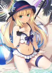  artoria_caster_(fate) artoria_caster_(second_ascension)_(fate) artoria_pendragon_(fate) ball bare_shoulders beach beachball bikini blonde_hair blue_hat blush breasts collarbone fate/grand_order fate_(series) female green_eyes hand_on_own_chest hat highres innertube long_hair looking_at_viewer navel neko_daruma outdoors shore sitting small_breasts smile solo staff swim_ring swimsuit thighs 