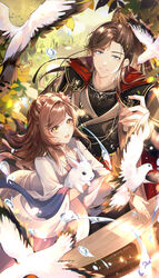  1boy :d absurdres animal artem_wing_(tears_of_themis) bird blue_eyes brown_hair chinese_clothes dove female flower grass green_eyes hair_flower hair_ornament highres holding holding_animal long_hair long_sleeves looking_at_animal nana895 open_mouth outdoors ponytail rabbit rosa_(tears_of_themis) smile tears_of_themis 