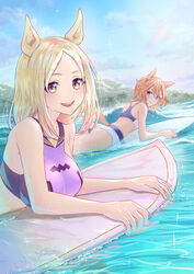  2girls animal_ears bare_shoulders bikini bikini_bralette blonde_hair blue_bikini breasts cloud day highres horse_ears horse_girl horse_tail looking_at_viewer lying medium_breasts medium_hair multiple_girls nabe_puyo narita_top_road_(umamusume) ocean on_stomach open_mouth orange_eyes outdoors purple_bikini purple_eyes racerback revision short_hair smile sparkle surfboard swimsuit t.m._opera_o_(umamusume) tail tankini umamusume water waves wet yellow_eyes 