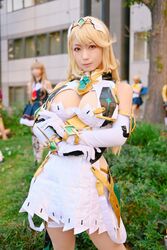  bare_shoulders blonde_hair breasts brown_eyes cleavage commentary_request cosplay cosplay_photo crossed_arms detached_sleeves dress elbow_gloves female gem gloves headpiece jewelry long_hair mythra_(xenoblade) mythra_(xenoblade)_(cosplay) photo_(medium) solo swept_bangs tiara white_dress white_gloves xenoblade_chronicles_(series) xenoblade_chronicles_2 