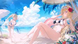  2girls :d anklet arm_up bare_shoulders barefoot beach bikini black_bikini blonde_hair blue_bikini blue_eyes blush breasts cleavage closed_mouth crossed_legs day flower foot_out_of_frame fymrie hair_flower hair_ornament highres holding jewelry large_breasts long_hair looking_at_viewer multiple_girls navel ocean original outdoors parasol ponytail side-tie_bikini_bottom sitting smile standing stomach swimsuit thighs umbrella underboob water yellow_eyes 