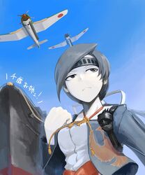  aircraft airplane b6n_tenzan black_eyes black_hair chitose_(kancolle) clenched_hand commentary_request female headband hetza_(hellshock) japanese_clothes kantai_collection pale_skin ship solo tassel torpedo turret watercraft 