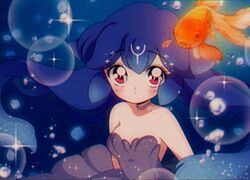  1980s_(style) bao_(vtuber) bao_(vtuber)_(1st_costume) blue_hair blush breasts bubble cleavage commentary dress english_commentary female fish glowing goldfish grey_dress indie_virtual_youtuber long_hair red_hair retro_artstyle small_breasts solo sparkle underwater upper_body virtual_youtuber ywuria 