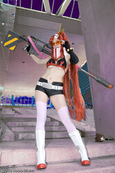  adjusting_eyewear belt bikini_top boots breasts cosplay elbow_gloves ellarcy fingerless_gloves glasses gloves gun long_hair medium_breasts photo ponytail red_hair short_shorts shorts skull solo studded_belt tengen_toppa_gurren_lagann thighhighs underboob weapon yoko_littner 