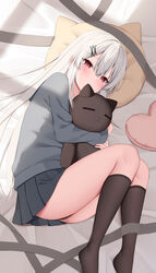  black_skirt commentary_request female highres holding holding_stuffed_toy kamu_(geeenius) kneehighs long_hair long_sleeves looking_at_viewer lying on_side original pillow pleated_skirt red_eyes school_uniform skirt socks solo stuffed_animal stuffed_cat stuffed_toy thighs white_hair yami-chan_(kamu_(geeenius)) 