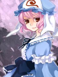  brown_eyes cherry_blossoms commentary_request female ghost hat japanese_clothes petals pink_hair saigyouji_yuyuko shiokoshi smile solo touhou triangular_headpiece upper_body 