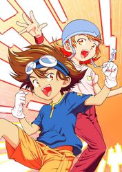  1boy 1daijida :d bad_id bad_pixiv_id blue_shirt brown_eyes brown_hair digimon digimon_adventure female goggles goggles_on_head helmet open_mouth orange_hair pants pink_shirt red_pants shirt short_sleeves shorts smile takenouchi_sora wristband yagami_taichi yellow_shorts 