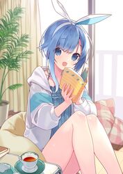  blue_eyes blue_hair book bow commentary_request female hairbow highres jacket looking_at_viewer monokaki_aer monokaki_aer_(artist) open_mouth re_aer short_hair sitting solo table virtual_youtuber window 