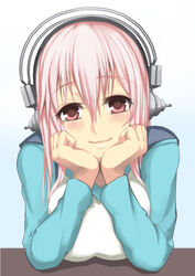  blush breasts commentary_request deni_m female hands_on_own_cheeks hands_on_own_face headphones large_breasts long_hair looking_at_viewer nitroplus pink_eyes pink_hair smile solo super_sonico 