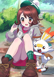  absurdres arm_up artist_name backpack bag beret blush brown_eyes brown_footwear brown_hair buck_teeth bush cardigan dress female gloria_(pokemon) hat highres looking_at_viewer open_mouth pokemon pokemon_swsh scorbunny sheyona shoes short_hair sitting stone_walkway sweatdrop teeth tree vegetation 