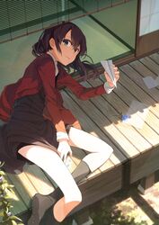  brown_hair cardigan commentary_request dress female flower green_eyes highres letter long_hair looking_at_viewer original paper_airplane porch solo tsukugu 