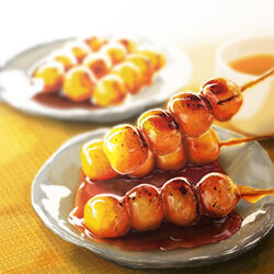  blurry commentary_request dango depth_of_field food food_focus humohumoelmo mitarashi_dango no_humans original overexposure plate skewer wagashi 