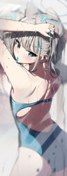  absurdres adjusting_hair animal_ears artist_name ass blue_archive blue_eyes blue_one-piece_swimsuit commentary competition_swimsuit cross_hair_ornament extra_ears female grey_hair hair_ornament halo highres liyom mouth_hold official_alternate_costume one-piece_swimsuit shiroko_(blue_archive) shiroko_(swimsuit)_(blue_archive) solo swimsuit wet wolf_ears 